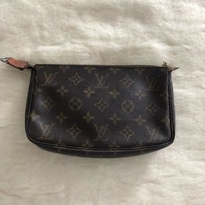 Genuine Louis Vuitton clutch.
